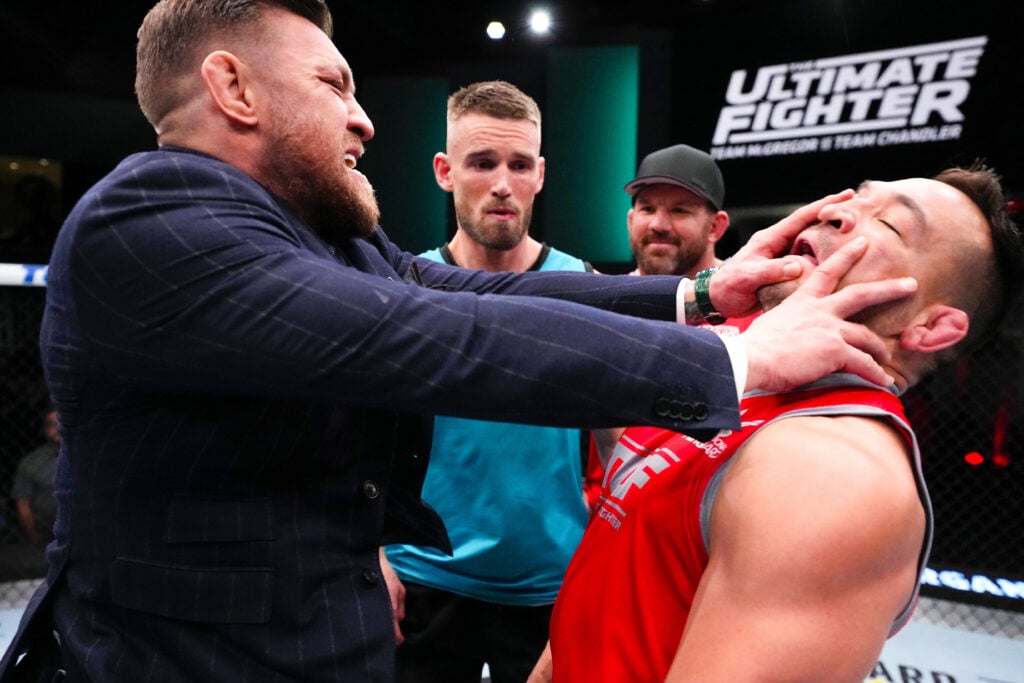 (L-R) Conor McGregor pushes Michael Chandler during filming of The Ultimate Fighter at UFC APEX on March 3, 2023 in Las Vegas, Nevada.